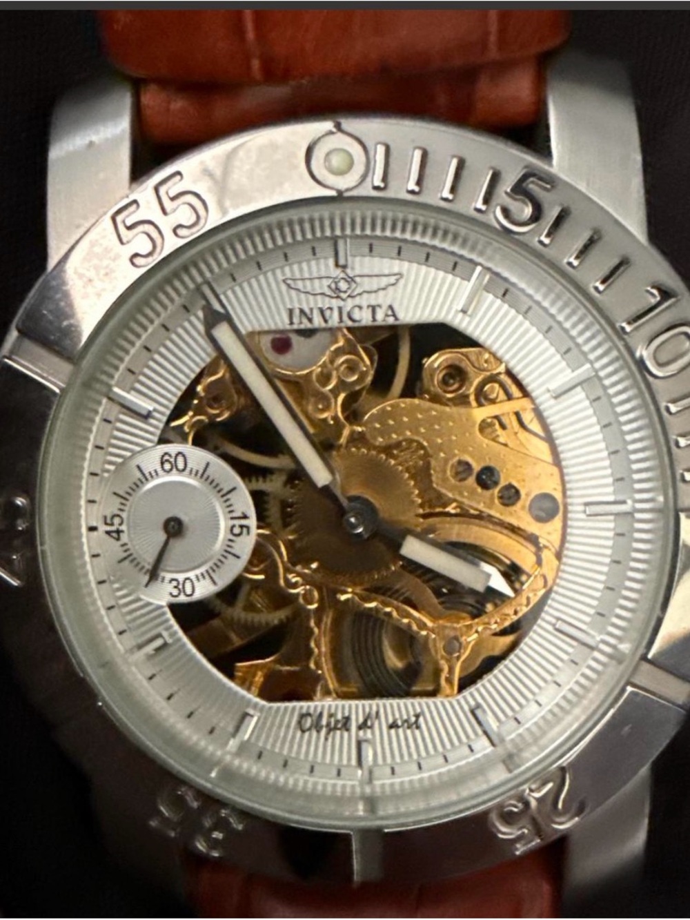 Invicta Silver Case Watch with Gold Skeleton Dial and Brown Strap